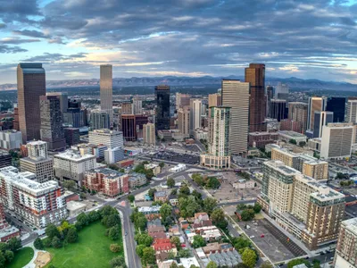 Denver skyline with Rocky Mountains in background